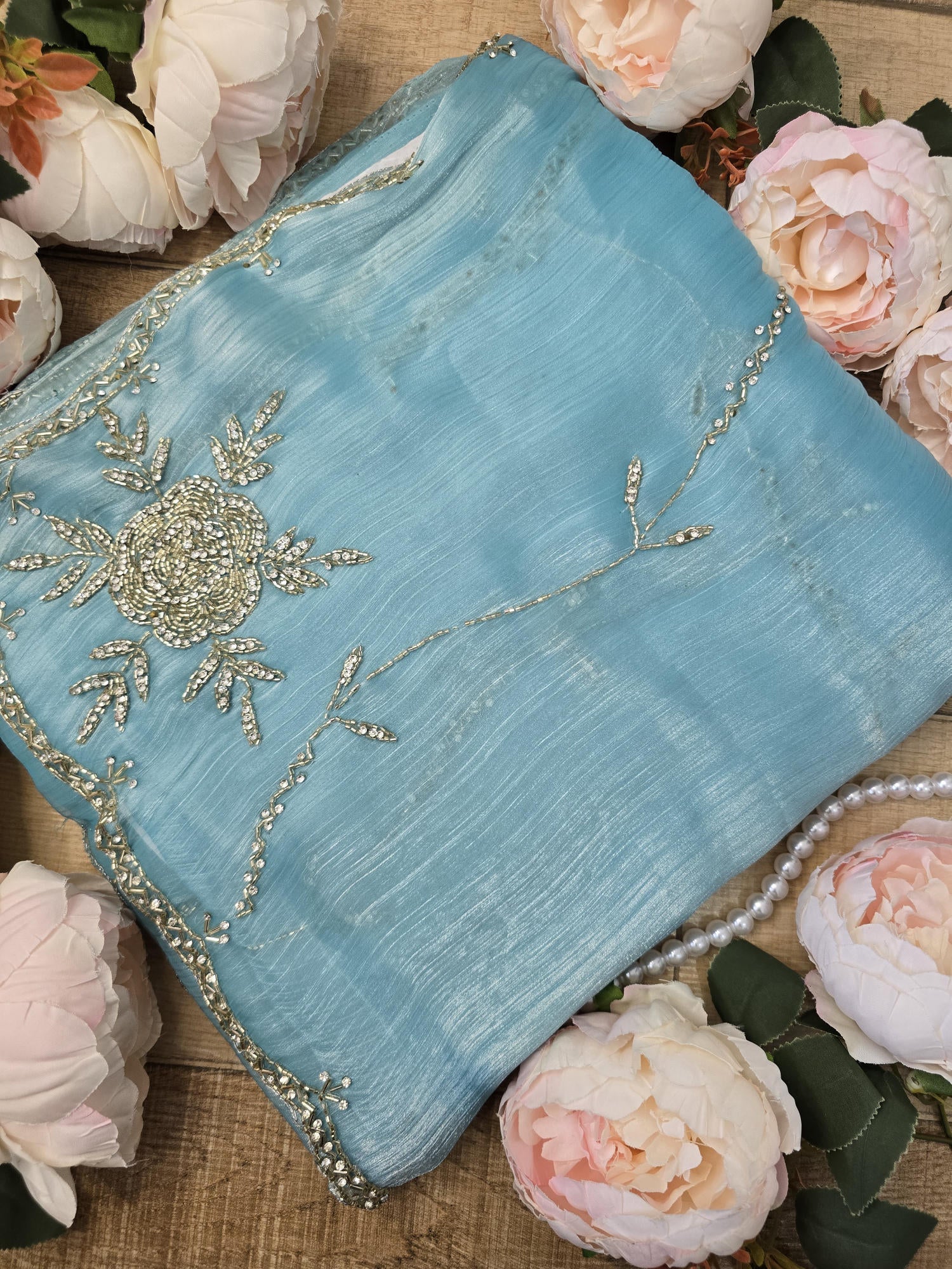 Light Sky Saree with Intricate Rose Embroidery, Silver Cut Dana, and Stone Work