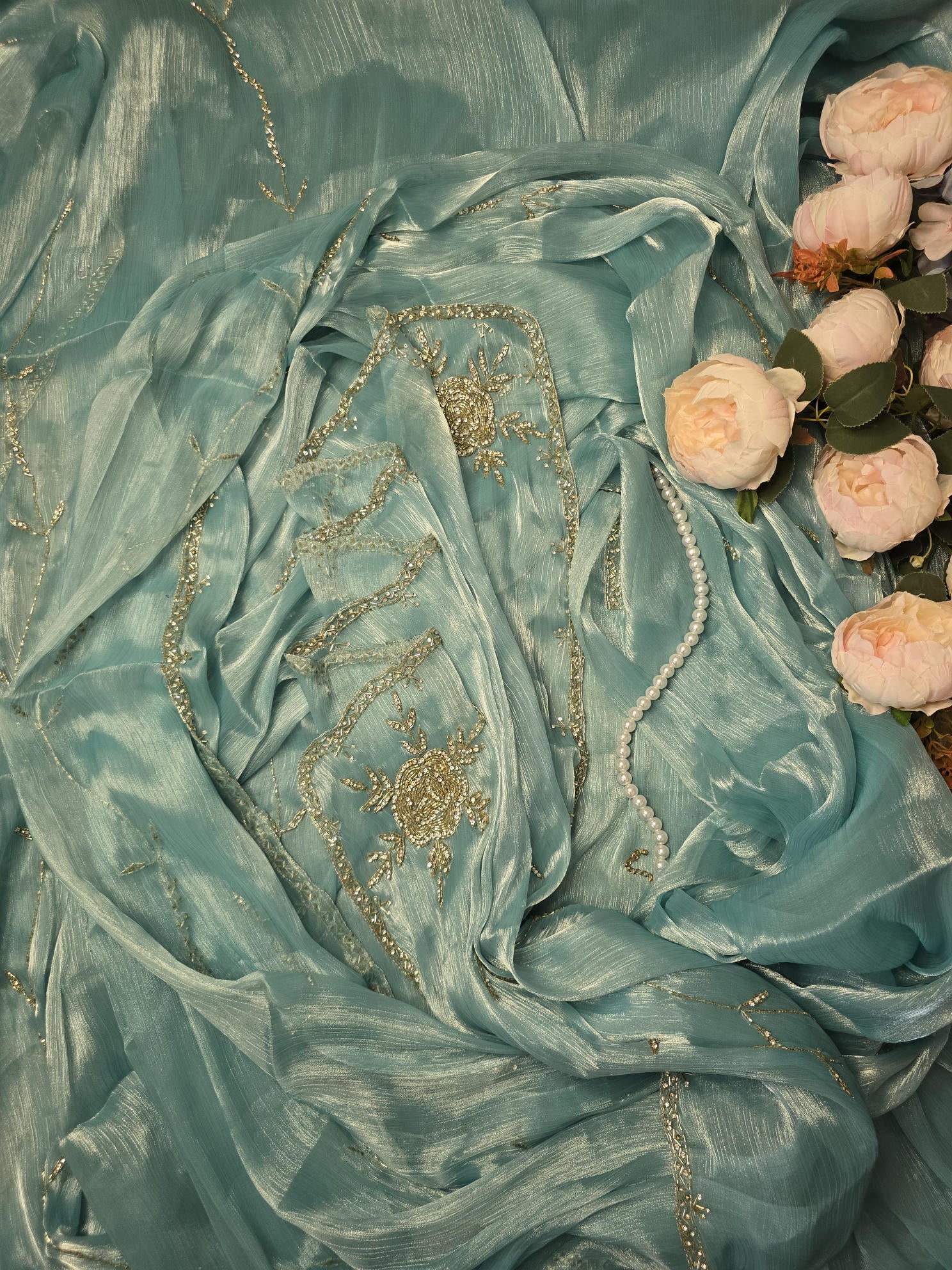 Light Sky Saree with Intricate Rose Embroidery, Silver Cut Dana, and Stone Work